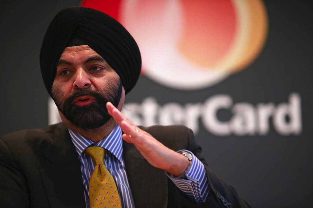 Ajay Banga, chief executive officer of MasterCard Inc., gestures as he speaks during a news conference at the Mobile World Congress in Barcelona, Spain, on Tuesday, March 3, 2015. The event, which generates several hundred million euros in revenue for the city of Barcelona each year, also means the world for a week turns its attention back to Europe for the latest in technology, despite a lagging ecosystem. Photographer: Pau Barrena/Bloomberg *** Local Caption *** Ajay Banga